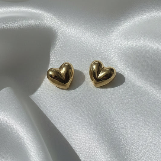 Embrace timeless elegance with these 3D Puffy Heart Stud Earrings