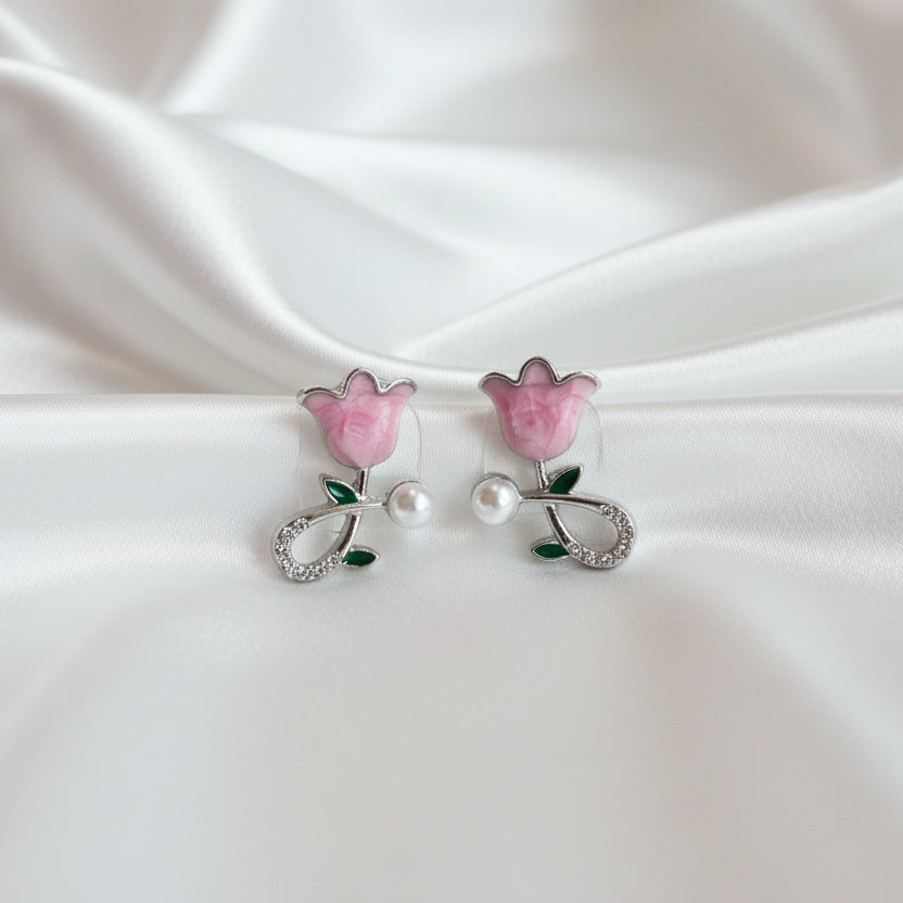 Add a touch of spring to your jewelry collection with these enchanting Pink Tulip Stud Earrings.