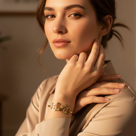 Elegant Interlocking Swan Bangle in Gold Tone (Free size)