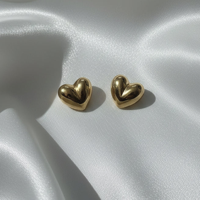 Embrace timeless elegance with these 3D Puffy Heart Stud Earrings
