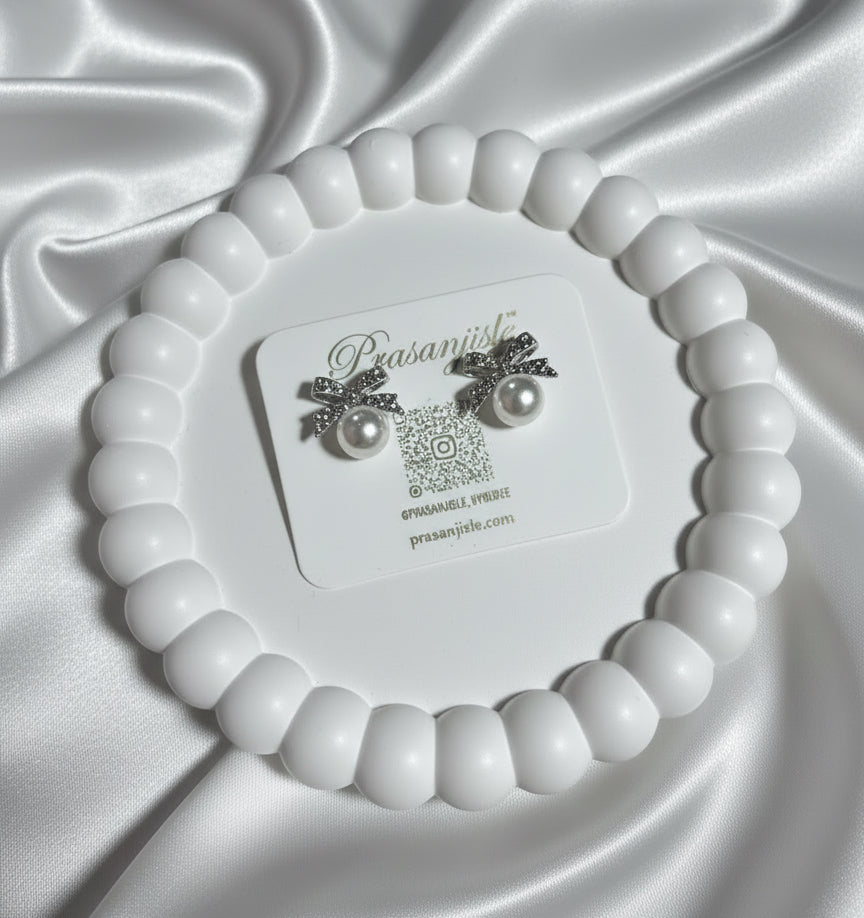 Timeless Glamour: Pearl Stud Earrings with Sparkling Bow