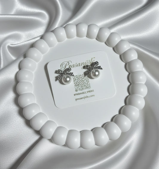 Timeless Glamour: Pearl Stud Earrings with Sparkling Bow