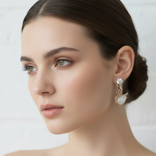 Elegant Swan Drop Earrings – Shimmering Cat-Eye & Crystal Accents