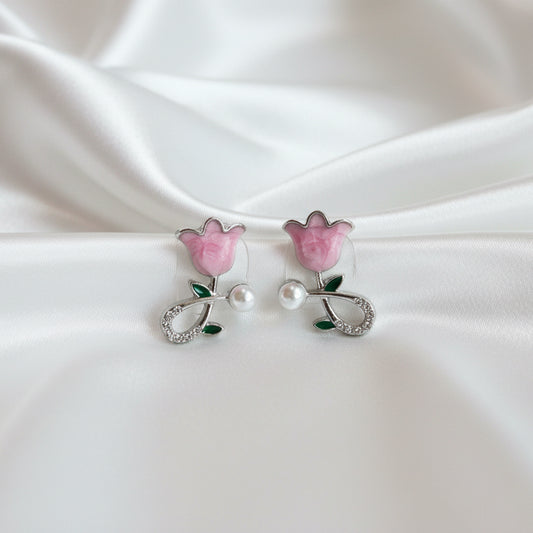 Add a touch of spring to your jewelry collection with these enchanting Pink Tulip Stud Earrings.