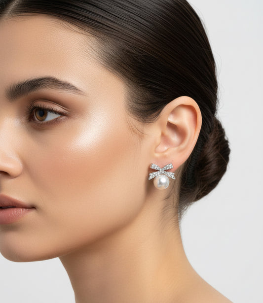 Timeless Glamour: Pearl Stud Earrings with Sparkling Bow