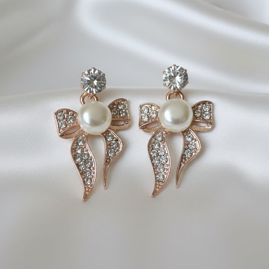 Elegant Crystal Ribbon Bow Earrings with Luminous Centerpiece
